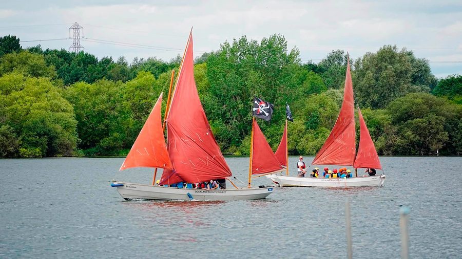 Pirate-themed sailing boats out on Stewartby Lake during the Water Activity Days
