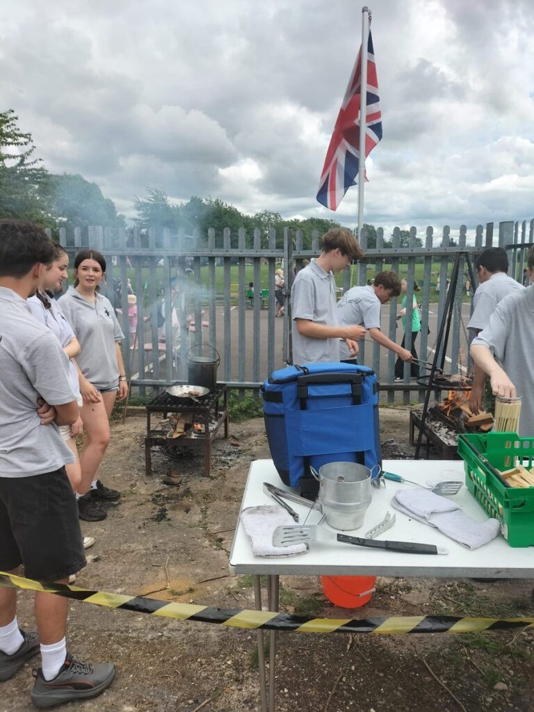 Cooking over an open fire at the Icknield Way Scout Group launch event