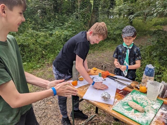 Flitwick Scouts making damper bread over an open fire