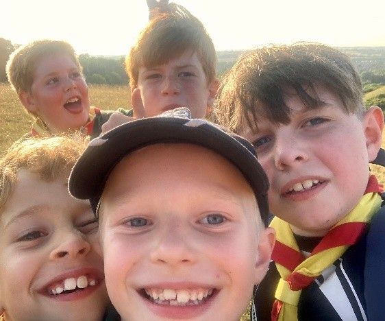 Harlington Scouts taking a group selfie at sunset