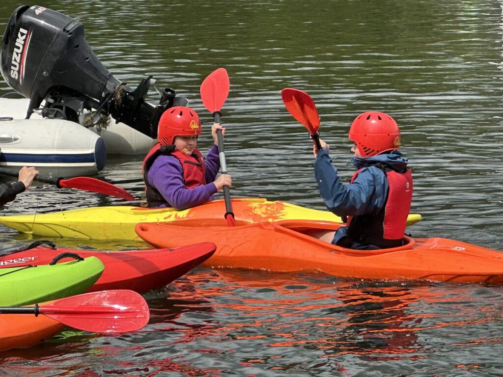 St Anne's Scouts kayaking on the water
